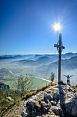Persons at summit of Kranzhorn, valley of Inn and Mangfall range in background, Kranzhorn, Chiemgau Alps, Upper Bavaria, Bavaria, Germany