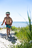 Boy, 5 years old, on the beach, dream beach between Strandmarken und Dueodde, sandy beach, summer, Baltic sea, Bornholm, Strandmarken, Denmark, Europe, MR