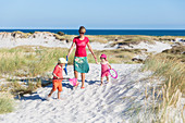 Young family, Mother and children hiking at the dream beach and dunes of Dueodde, sandy beach, Summer, Baltic sea, Bornholm, Dueodde, Denmark, Europe, MR