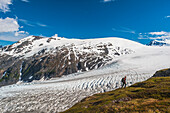 A man hiking near the Harding Ice Field Trail in Kenai Fjords National Park on the Kenai Peninsula in South Central Alaska