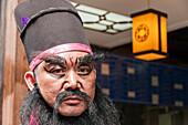 A Chinese man performer as in ancient times in Jinli ancient street, Chengdu, Sichuan province, China