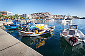 Boats in the harbour and view of the coastline, Kavala, Greece