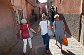 Tourists in the alleys of the Medina, Marrakech, Morocco