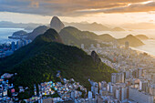 View of the Sugar Loaf, Sao Joao favela, Guanabara bay, the Atlantic and the mountains of Rio and Niteroi, Rio de Janeiro, Brazil, South America