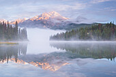 Mist shrouded Pyramid Lake at dawn in the Canadian Rockies, Jasper National Park, UNESCO World Heritage Site, Alberta, Canada, North America