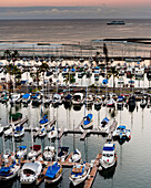 Elevated view of a sailboats in a yacht harbor in a Hawaii, USA.