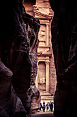 View of the Treasury Building through the walls of the Siq at Petra, Jordan