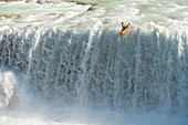 One kayaker dropping a waterfall in Cascadas de Agua Azul, Chiapas, Mexico.