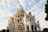Low angle view of ornate church and dome, Paris, Ile-de-France, France