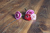 Roses on wooden table