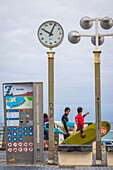 surfers, zurriola beach, san sebastian, donostia, basque country, spain