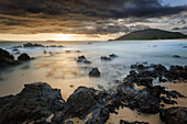 sunset over the volcanic rock beach, big beach, makena, kihei, maui, hawaii, united states, usa