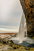 Seljalandsfoss, Waterfall in southern iceland in Winter at sunset, Iceland