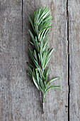 Close-up of rosemary on wooden table