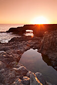 Rock arch at sunrise, Charco Manso Bay, Punta Norte near Echedo, UNESCO biosphere reserve, El Hierro, Canary Islands, Spain, Atlantic, Europe