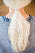 Rear view of ponytail of gray hair of Caucasian woman