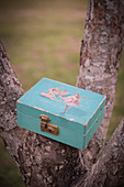 Vintage Jewelry Box on Tree Branch