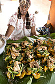 grilled chicken on steamed vegetables at the Port Vila markets