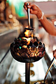 an old oil lamp in Wat Phrathat Doi Suthep , Chang Mai, Thailand