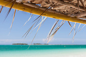 Tropical beach. View of turquoise water from a wooden hut in Playa Pilar, one of the most beautiful and famous beach in Cuba. Cayo Guillermo