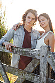 Young couple spending time together outdoors, portrait