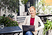 Businesswoman using laptop computer