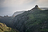 prominent rock formation and trails in the mountaineous landscape around National Park Parque Nacional de Garajonay, La Gomera, Canary Islands, Spain