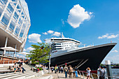 The cruise liner queen Mary 2 in the cruise center harbour city, at the company headquarters Unilever office house, harbour city, Hamburg, Germany