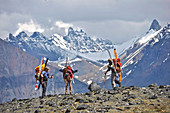 Skiers haul a cache to Camp One on the Sheep Glacier in preparation for a ski ascents of Mount Sanford in the Wrangell-St. Elias National Park outside of Glennallen, Alaska June 2011.  Mount Sanford at 16,237 feet is the sixth tallest mountain in the Unit