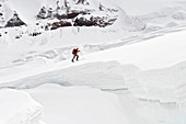 The team carries a cache past the ice fall to 11,000-feet on a ski ascent of  Mount Sanford Sheep Glacier Route in the Wrangell-St. Elias National Park outside of Glennallen, Alaska June 2011.  Mount Sanford at 16,237 feet is the sixth tallest mountain in