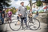 An elegant man dressed in vintage style. Eroica is a cycling event that takes place since 1997 in the province of Siena with routes that take place mostly on dirt roads with vintage bicycles. Usually it held on the first Sunday of October.