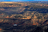 Small aircraft over Palo Duro Canyon from the air.
