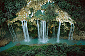 Aerial view of Tamul Waterfall (330 feet high) where Rio Gallinas cascades into the Rio Santa Maria river in the Huasteca Potosina region, Mexico