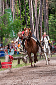 Fie, South Tyrol, Italy. The third tournament at Lake FiÃ¨ is the gallop. The wooden ball must be put into the basket