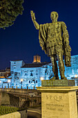 Imperial Forum, Rome, Lazio, Italy. The Statue of Emperor Julius Caesar at night