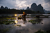 Asia, China, Xingping, Li River, Cormorant Fisherman