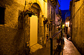 Illuminated allyway in the historic centre of Pratola