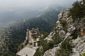 Ruins of the Buffavento Castle in the Pentadaktylos mountains in fog near Girne,  North Cyprus