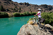 The Roxburgh Bike Trail following the Clutha River through a dramatic gorge, Otago, South Island, New Zealand