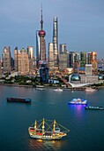 China, Shanghai City, Pudong Skyline, ,Oriental Pearl, World Financial Center and Shanghai Towers, Huangpu River.