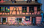 Bikes in front of ancient house La Petite France Strasbourg Alsace France.