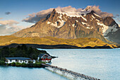 Chile, Magallanes Region, Torres del Paine National Park, Lago Pehoe, elevated view of Hosteria Pehoe, dawn.