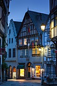 Germany, Hesse, Limburg an der Lahn, traditional half-timbered building, dawn.