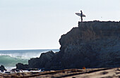 Surfer on a cliff, Mauritania.