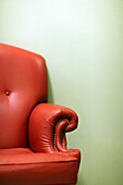 Half image of a leather arm chair, Moscow, Russia, Europe.