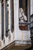 Sculptures in a window in the Born district in Barcelona, Catalonia, Spain.