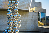 Guggenheim Museum and spheres sculpture. Bilbao, Spain.