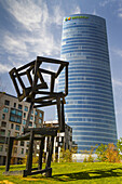 'Iberdrola Tower and ''Chaos Nervion'' sculpture. Bilbao, Biscay, Basque Country, Spain, Europe.'