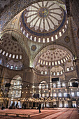 Interior of the Sultan Ahmet or Blue Mosque, Sultanahmet, Istanbul, Turkey.