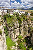 Houses on Edge of El Tajo gorge, Ronda, Malaga province, Andalusia, Spain, Europe.